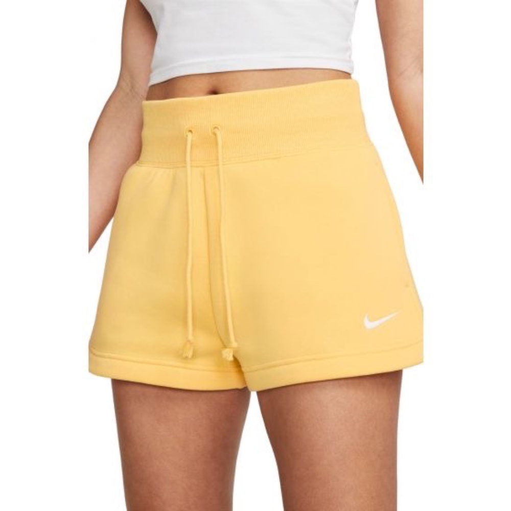 Nike Women's Phoenix Fleece High Waisted Shorts in Light Orange